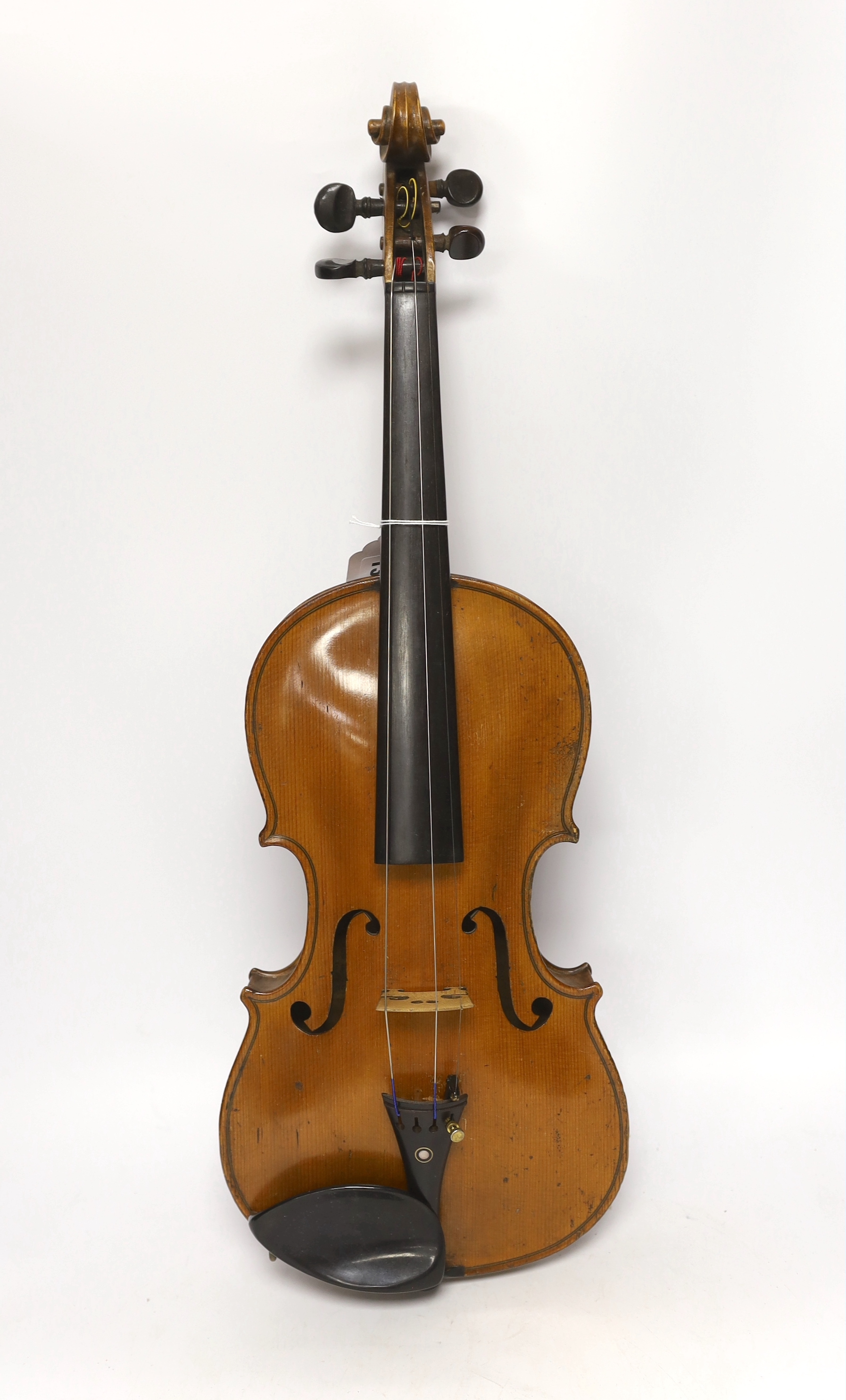 A cased early twentieth century violin by Rudolph Raymond, with maker’s label inside the body stating ‘made 1904’, body 36cm, in a good case with a label for W.E. Hills & Sons, Violin Makers, 140 New Bond St. London